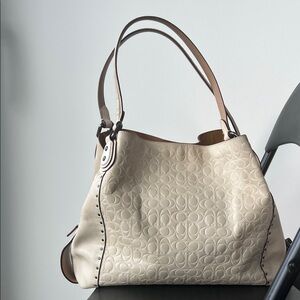 Coach Edie 31 signature Leather Shoulder Bag with rivets